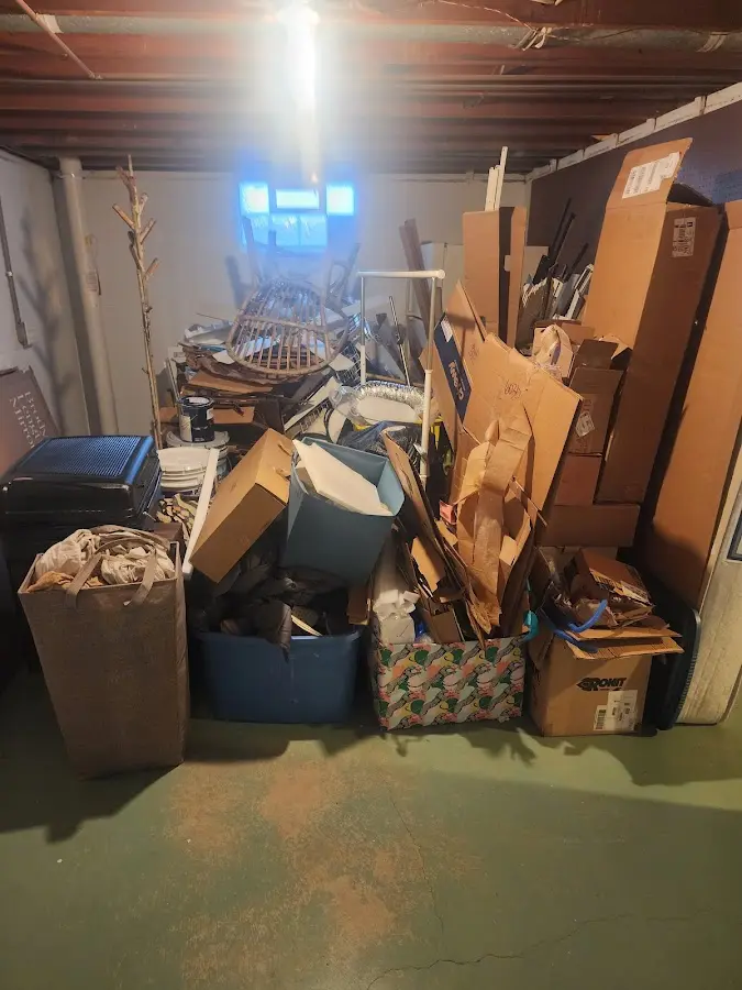 Roll-off dumpster container at job site for 2 Yard Dumpster Rental in Springville